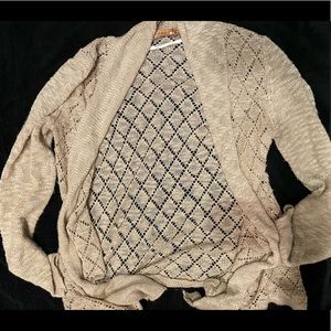 Light neutral pink cardigan. In size small.